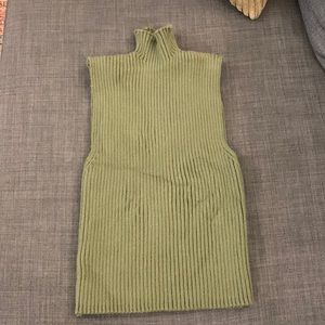 Green knit sleeveless turtleneck